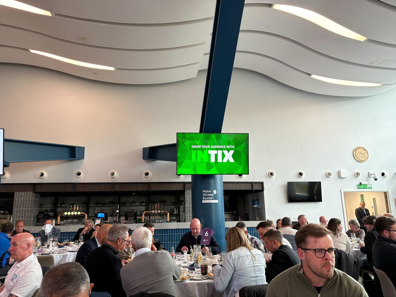 INTIX on the screens in the hospitality lounge on cup final day